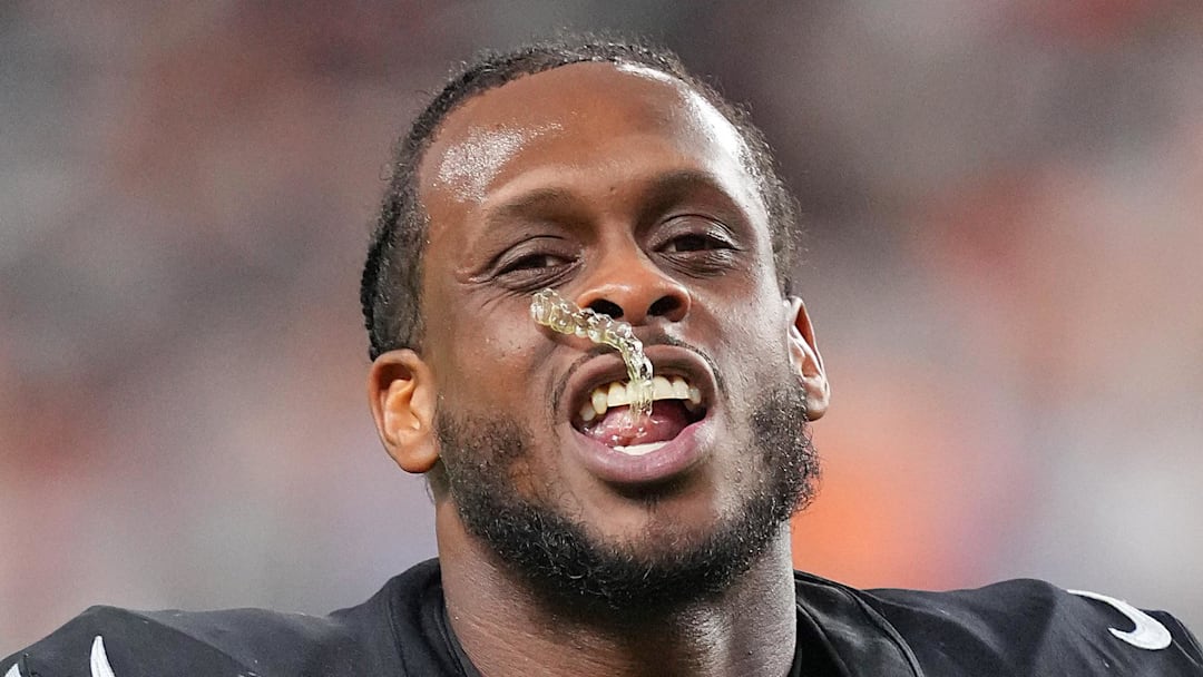 Nov 23, 2025; Paradise, Nevada, USA; Las Vegas Raiders quarterback Geno Smith (7) walks off the field after the Cleveland Browns defeated the Raiders 24-10 at Allegiant Stadium. Mandatory Credit: Stephen R. Sylvanie-Imagn Images
