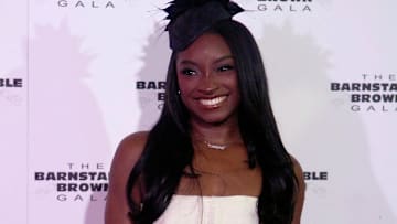 Olympian Simone Biles poses on the Barnstable Brown Derby Eve Gala red carpet Friday night. May 02, 2025