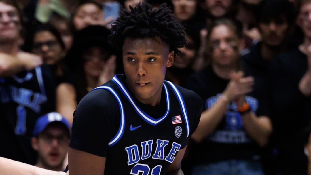 Duke Blue Devils center Patrick Ngongba (21) posts up against Florida Gators forward Alex Condon (21) during the second half at Cameron Indoor Stadium in Durham, NC on Tuesday, December 2, 2025. [Matt Pendleton/Gainesville Sun]