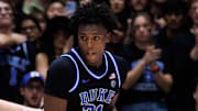 Duke Blue Devils center Patrick Ngongba (21) posts up against Florida Gators forward Alex Condon (21) during the second half at Cameron Indoor Stadium in Durham, NC on Tuesday, December 2, 2025. [Matt Pendleton/Gainesville Sun]