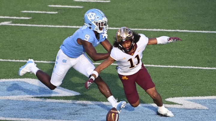 Sep 16, 2023; Chapel Hill, North Carolina, USA;  Minnesota Golden Gophers wide receiver Elijah Spencer (11) is unable to make a catch as North Carolina Tar Heels defensive back Armani Chatman (9) defends in the fourth quarter at Kenan Memorial Stadium. Mandatory Credit: Bob Donnan-USA TODAY Sports