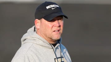 Purdue Boilermakers head coach Barry Odom looks down field 