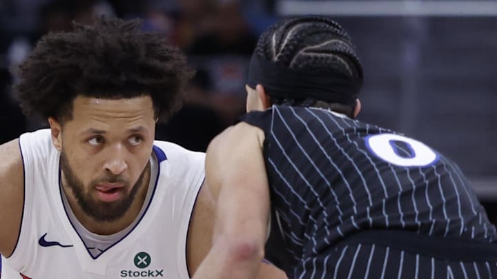 Apr 29, 2026; Detroit, Michigan, USA; Detroit Pistons guard Cade Cunningham (2) dribbles defended by Orlando Magic guard Anthony Black (0) : Rick Osentoski-Imagn Images