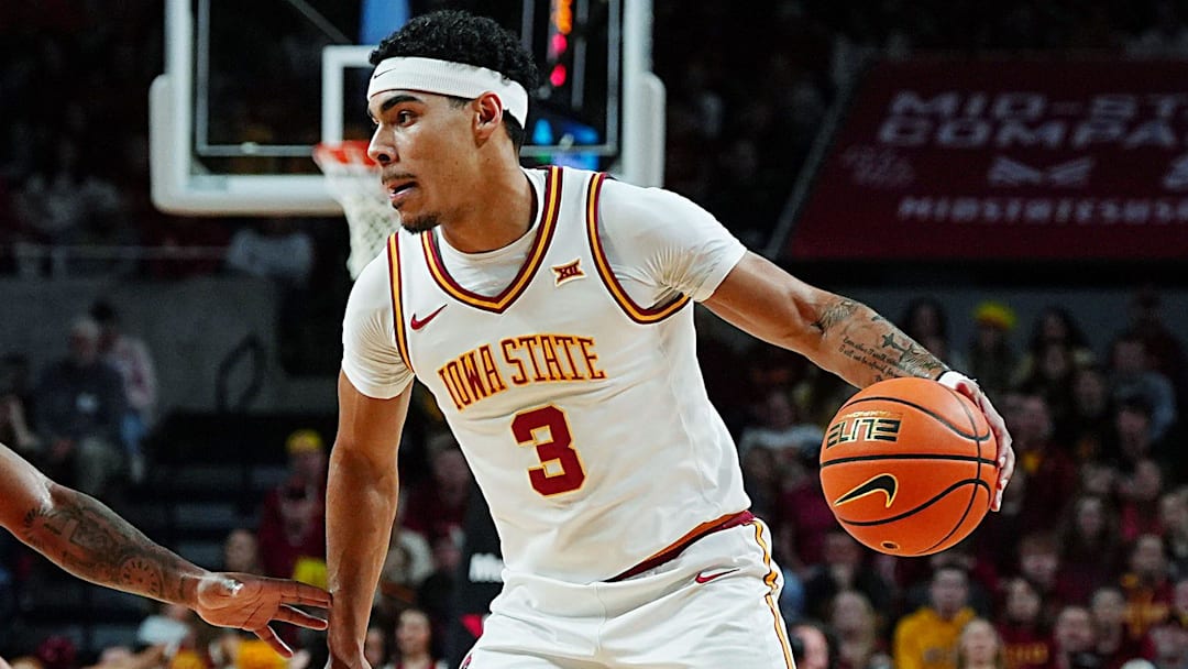 Iowa State Cyclones guard Tamin Lipsey (3) looks for a drive around Oklahoma State Cowboys guard Kanye Clary (1) and Oklahoma State Cowboys forward Parsa Fallah (22) during the first half in the Big-12 men’s basketball on Jan. 10, 2026, at Hilton Coliseum in Ames, Iowa.