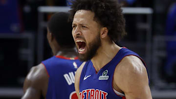 Nov 10, 2025; Detroit, Michigan, USA;  Detroit Pistons guard Cade Cunningham (2) celebrates in overtime against the Washington Wizards at Little Caesars Arena.