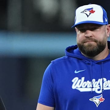 Nov 1, 2025; Toronto, Ontario, CAN; Toronto Blue Jays manager John Schneider (14) reacts after the benches clear in the fourth inning against the Los Angeles Dodgers during game seven of the 2025 MLB World Series at Rogers Centre. 