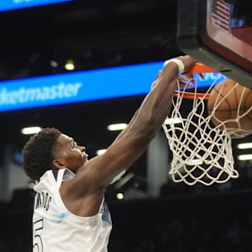 Apr 3, 2025; Brooklyn, New York, USA; Minnesota Timberwolves shooting guard Anthony Edwards (5) dunks the ball against the Brooklyn Nets during the second half at Barclays Center. Mandatory Credit: Gregory Fisher-Imagn Images