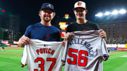 Atlanta Braves pitcher Spencer Schwellenbach (left) and Baltimore Orioles pitcher Cade Povich (right) exchange jerseys after dueling Wednesday. The two players were teammates at Nebraska.
