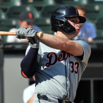 Aug 25, 2024; Chicago, Illinois, USA; Detroit Tigers second base Colt Keith (33) hits a two-run double during the eighth inning against the Chicago White Sox at Guaranteed Rate Field. 