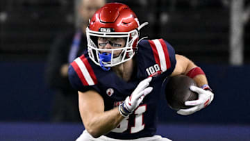 Jan 30, 2025; Arlington, TX, USA; East wide receiver Efton Chism of Eastern Washington (81) runs with the ball during the first half against the West at AT&T Stadium. Mandatory Credit: Jerome Miron-Imagn Images