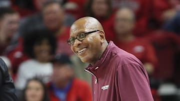 Little Rock Trojans head coach Darrell Walker has trouble believing a call during the second half against the Arkansas Razorbacks at Bud Walton Arena Friday. Walker's injury-plagued team kept it relatively close against No. 20 Arkansas but the Hogs had too much firepower and won 79-67.