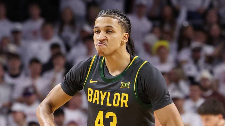 Feb 7, 2026; Ames, Iowa, USA; Baylor Bears guard Cameron Carr (43) celebrates are a basket against the Iowa State Cyclones during the first half at James H. Hilton Coliseum. Mandatory Credit: Reese Strickland-Imagn Images