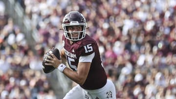 Sep 16, 2023; College Station, Texas, USA; Texas A&M Aggies quarterback Conner Weigman (15) rolls out of the pocket on a play during the second quarter against the Louisiana Monroe Warhawks at Kyle Field. Mandatory Credit: Troy Taormina-USA TODAY Sports