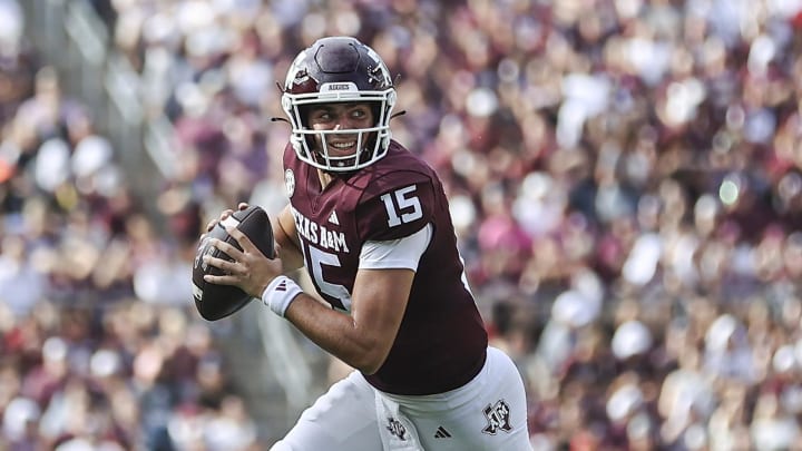 Sep 16, 2023; College Station, Texas, USA; Texas A&M Aggies quarterback Conner Weigman (15) rolls out of the pocket on a play during the second quarter against the Louisiana Monroe Warhawks at Kyle Field. Mandatory Credit: Troy Taormina-USA TODAY Sports