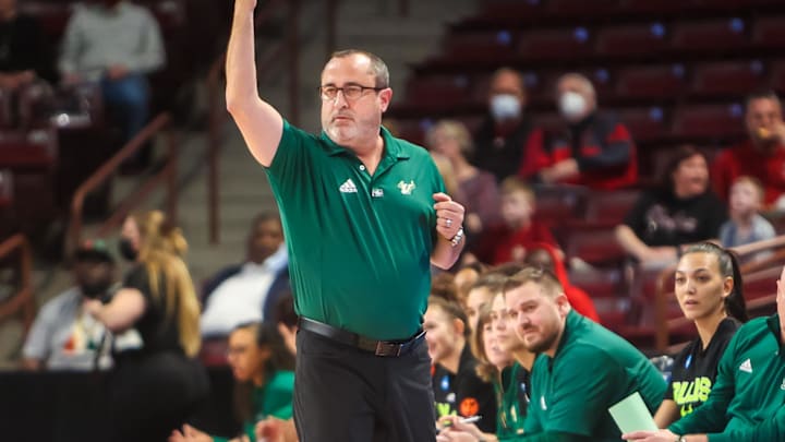 Mar 18, 2022; Columbia, South Carolina, USA; South Florida Bulls head coach Jose Fernandez directs his team against the Miami Hurricanes in the first quarter at Colonial Life Arena. Mandatory Credit: Jeff Blake-Imagn Images Mar 18, 2022; Columbia, South Carolina, USA; South Florida Bulls head coach Jose Fernandez directs his team against the Miami Hurricanes in the first quarter at Colonial Life Arena. Mandatory Credit: Jeff Blake-Imagn Images