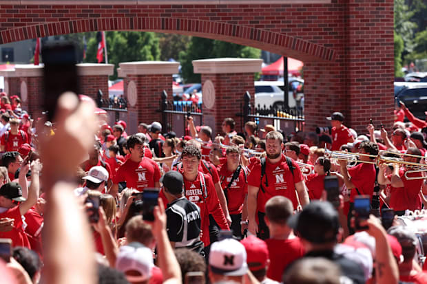 The Nebraska Cornhuskers take part in a new Legacy Walk path that goes in front of Osborne Legacy Complex.