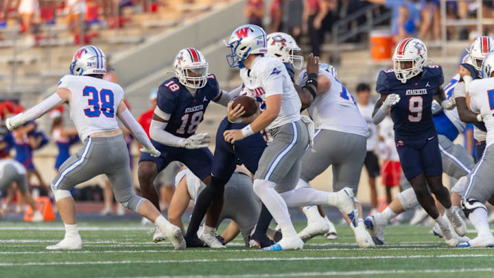 Austin Westlake's Rees Wise looks for running room in a game Sept. 19 against Humble Atascocita. 