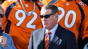 Feb 9, 2016; Denver, CO, USA; Denver Broncos general manager John Elway (left) talks with radio host Dave Logan during the Super Bowl 50 championship parade celebration at Civic Center Park. Mandatory Credit: Isaiah J. Downing-Imagn Images