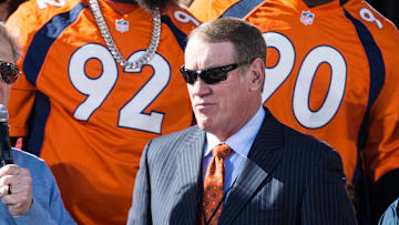 Feb 9, 2016; Denver, CO, USA; Denver Broncos general manager John Elway (left) talks with radio host Dave Logan during the Super Bowl 50 championship parade celebration at Civic Center Park. Mandatory Credit: Isaiah J. Downing-Imagn Images