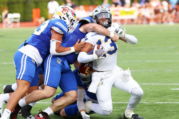 The Team Columbia defense makes a stop at the 2024 Les Schwab Bowl in Portland, Oregon. (Photo by Dan Brood) 