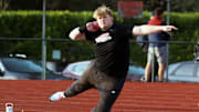 Lincoln senior Brady Holland gets ready to throw the shot put during the Cardinals’ Portland Interscholastic League dual meet at Wells.