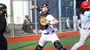 Wilsonville senior catcher Mark Wiepert makes a pickoff throw to first base during the Wildcats’ 15-1 win over Centennial. 