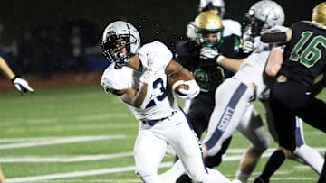 LaMarcus Bell had three touchdowns in Lake Oswego's season-opening win.