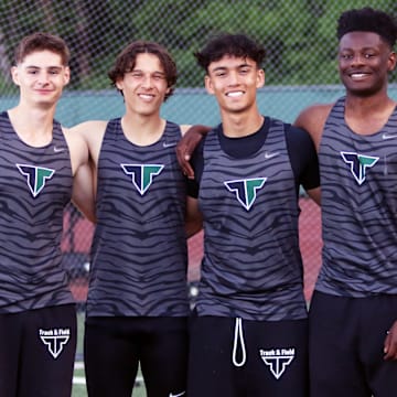 Tigard’s (from left) Daniel Rotaru, Micah Gerhard, Brayden Nee and Marcus Burton are part of deep group of Tigers sprinters who have shined in relay races this season.