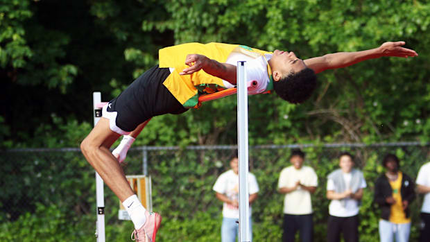 West Linn senior Warren Stanton, here barely missing at an attempt at 6-7.25.