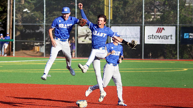 Grant’s (from left) Luke Caron, Grant Snidow and Rafferty Cruikshank begin celebrating following the Generals’ 8-2 win.