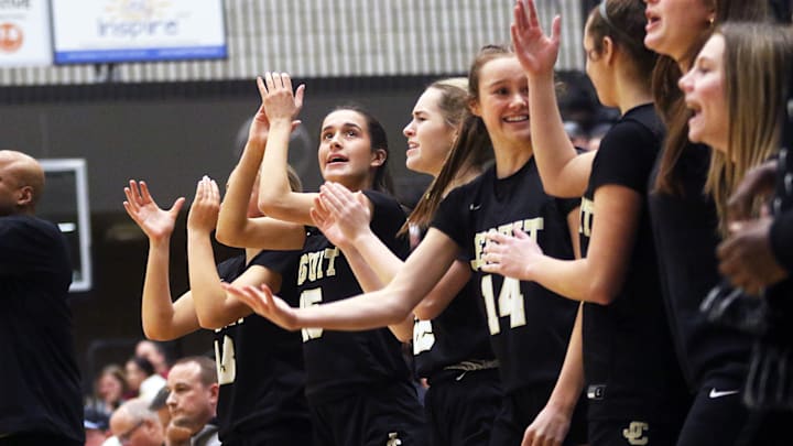 Jesuit players, including Lauren Reding, Anna McCullagh, Kelly Mattson and Samantha Stark, cheer during the final moments of the Crusaders’ 44-37 win at Mountainside in a key Metro League contest. Jesuit players, including Lauren Reding, Anna McCullagh, Kelly Mattson and Samantha Stark, cheer during the final moments of the Crusaders’ 44-37 win at Mountainside in a key Metro League contest.