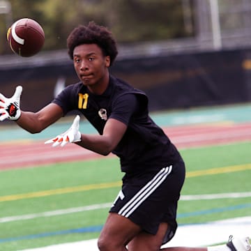 Reynolds junior receiver/defensive back Elliott Bruce makes a catch at Saturday’s The Chosen 1Hundred event at Jesuit High School.
