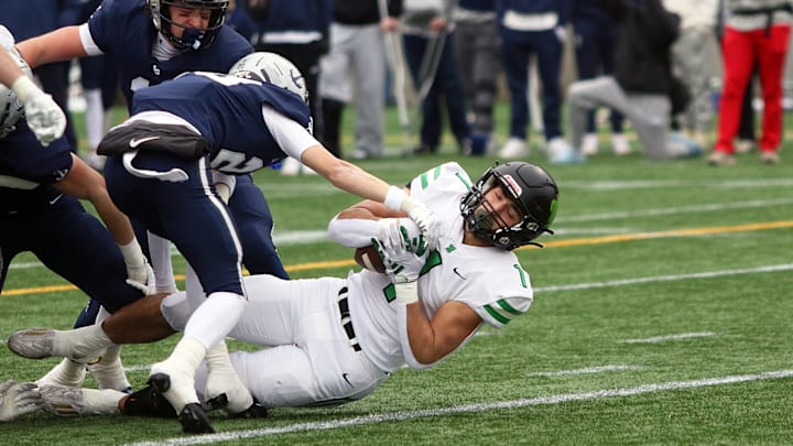 Hudson Hardy scored the first touchdown of the Oregon 6A Open championship game, giving West Linn an early lead.