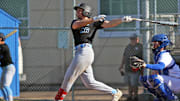 South Salem senior Noah Scharer takes a swing at the plate during the Saxons’ 25-4 win at McNary. Scharer had two hits and two RBIs in the victory.