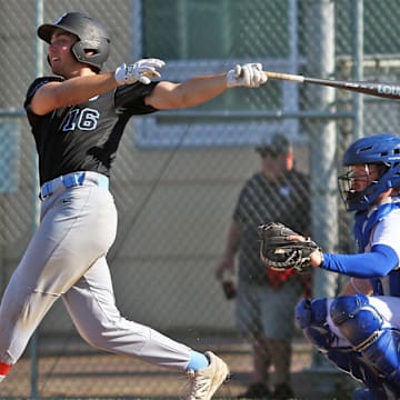 South Salem senior Noah Scharer takes a swing at the plate during the Saxons’ 25-4 win at McNary. Scharer had two hits and two RBIs in the victory.