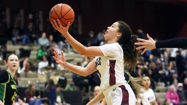 Love Lei Best had 12 points and five assists for Tualatin in a second-round OSAA Class 6A girls basketball playoff victory over Nelson on Friday night.