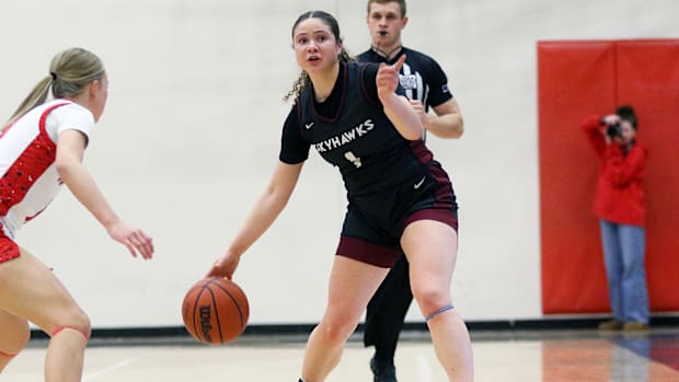 Southridge junior guard Sara Mangan looks to get a play in motion for the Skyhawks in their 60-29 victory at Southridge.
