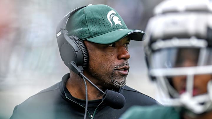 Michigan State's wide receivers coach Courtney Hawkins looks on during the spring game on Saturday, April 16, 2022, at Spartan Stadium in East Lansing. Michigan State's wide receivers coach Courtney Hawkins looks on during the spring game on Saturday, April 16, 2022, at Spartan Stadium in East Lansing.