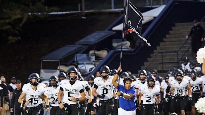 Tualatin opened the season with an impressive victory over Clackamas. Tualatin opened the season with an impressive victory over Clackamas.