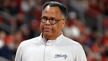 Dec 6, 2025; Raleigh, North Carolina, USA; Liberty Flames head coach Ritchie McKay looks on during the first half of the game against the NC State Wolfpack at Lenovo Center. Mandatory Credit: Jaylynn Nash-Imagn Images