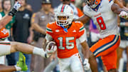 Nov 8, 2025; Miami Gardens, Florida, USA; Miami Hurricanes wide receiver Daylyn Upshaw (15) rushes after a reception against the Syracuse Orange during the second quarter at Hard Rock Stadium. Mandatory Credit: Jeff Romance-Imagn Images