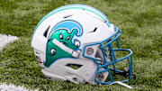 Dec 3, 2022; New Orleans, Louisiana, USA; Tulane Green Wave helmet on the field against the UCF Knights during the first half  at Yulman Stadium. 