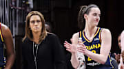 Jun 14, 2025; Indianapolis, Indiana, USA; Indiana Fever forward Aliyah Boston (7), head coach Stephanie White, guard Caitlin Clark (22) and assistant coach Karima Christmas-Kelly react to action during a game between the Indiana Fever and the New York Liberty at Gainbridge Fieldhouse. Mandatory Credit: Grace Smith-Imagn Images