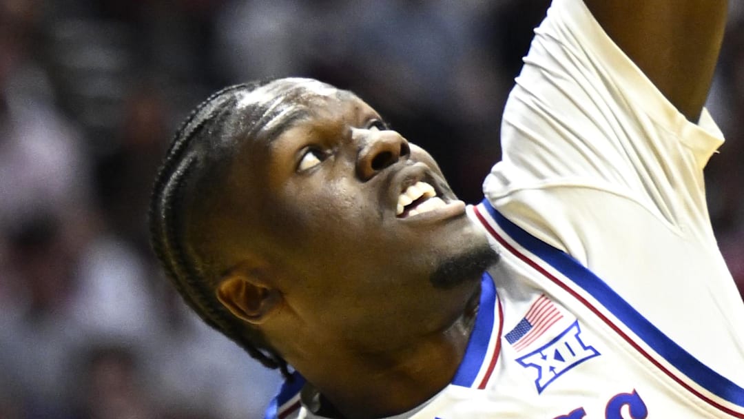 Mar 20, 2026; San Diego, CA, USA; California Baptist Lancers forward Thomas Ndong (25) shoots against Kansas Jayhawks forward Flory Bidunga (40) in the first half during a first round game of the men's 2026 NCAA Tournament at Viejas Arena. Mandatory Credit: Denis Poroy-Imagn Images