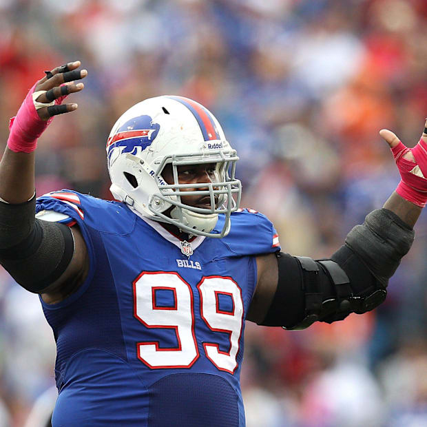 Former Buffalo Bills defensive tackle Marcell Dareus celebrates after making a play during a game.