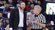 Dec 18, 2018; Spokane, WA, USA; Texas-Arlington Mavericks head coach Chris Ogden talks with a referee during the second half against the Gonzaga Bulldogs at McCarthey Athletic Center. The Bulldogs won 89-55. Mandatory Credit: James Snook-Imagn Images