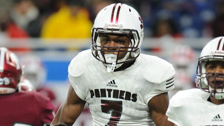 River Rouge defensive back Armorion Smith (7) reacts after stopping Muskegon from gaining a first down in the second quarter.