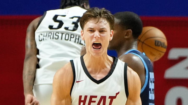 Jul 22, 2024; Las Vegas, NV, USA; Miami Heat guard Pelle Larsson (9) reacts with center Kel’el Ware (7) after scoring against the Memphis Grizzlies during the overtime at Thomas & Mack Center. Mandatory Credit: Lucas Peltier-Imagn Images