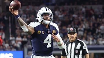 Dallas Cowboys quarterback Dak Prescott throws a pass for a successful two-point conversion against the Chiefs.
