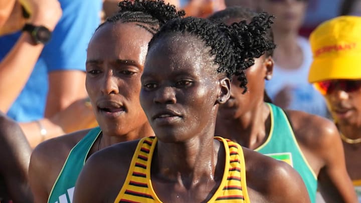 Aug 26, 2023; Budapest, Hungary; Rebecca Cheptegei (UGA) and Keira D'Amato (USA) run during the World Athletics Championships Budapest 23 women's marathon.